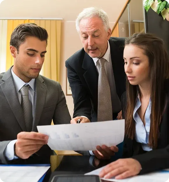 Manager speaking with employees