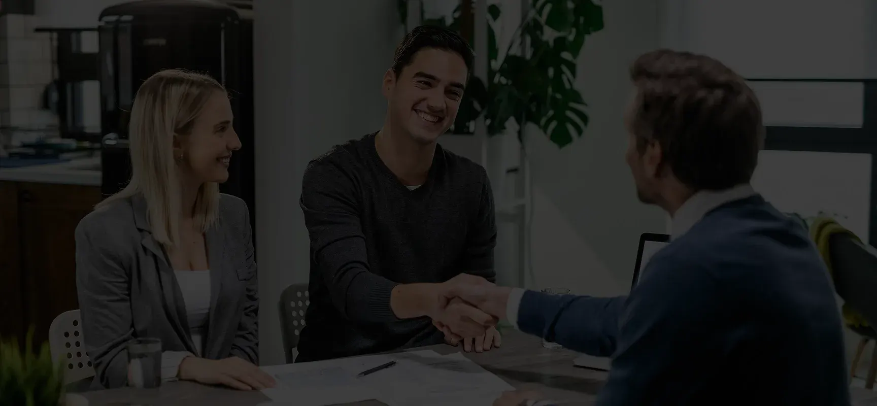 Advisor meeting with business owners